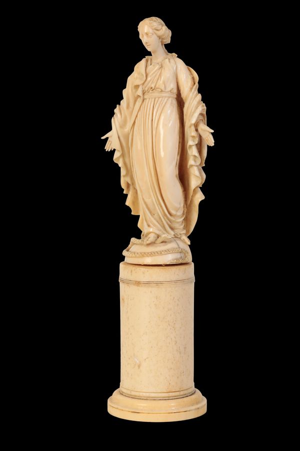 A DIEPPE SCULPTED IVORY MODEL OF SAINT MARGARET,