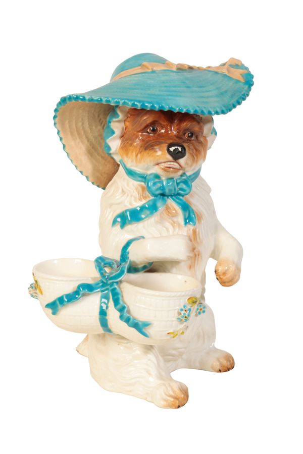 A VICTORIAN GLAZED CERAMIC MODEL OF AN ANTHROPOMORPHISED DOG, MOORE BROS.