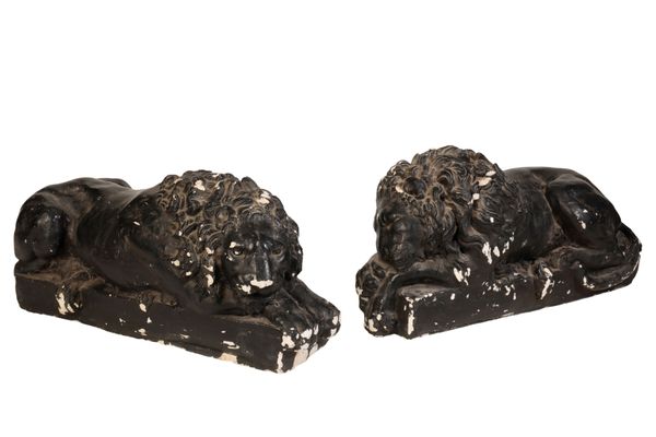 AFTER ANTONIO CANOVA (1757 - 1822), A PAIR OF PAINTED PLASTER MODELS OF RECUMBENT LIONS,