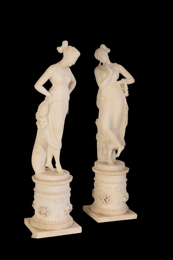 A PAIR OF ITALIAN ALABASTER FIGURES OF MUSES, 19TH CENTURY, IN NEOCLASSICAL STYLE,