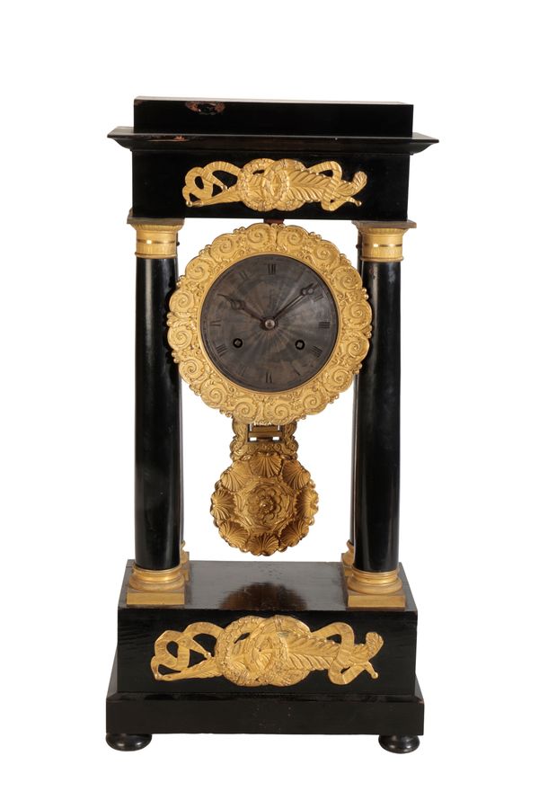 A RESTAURATION EBONIZED PORTICO CLOCK,