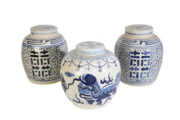 A PAIR OF CHINESE BLUE AND WHITE GINGER JARS AND COVERS
