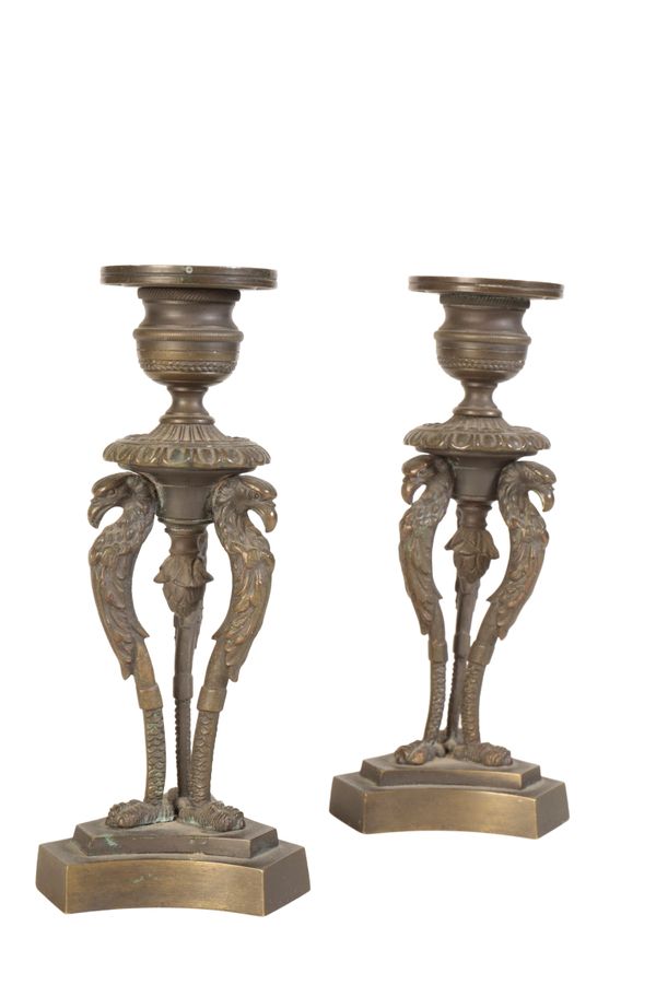 A PAIR OF REGENCY BRONZE CANDLESTICKS