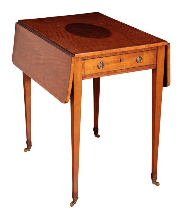 A FINE GEORGE III SATINWOOD AND AMBOYNA PEMBROKE TABLE OF SHERATON DESIGN,