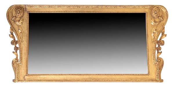 A CARVED GILTWOOD AND COMPOSITION OVERMANTLE MIRROR IN KENTIAN STYLE,