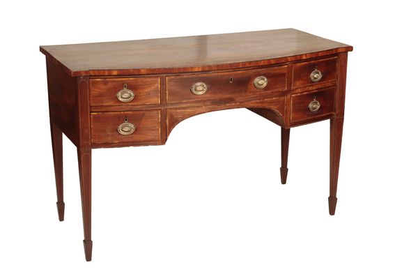 A MAHOGANY AND CROSSBANDED BOWFRONT DRESSING TABLE, IN GEORGE III STYLE,