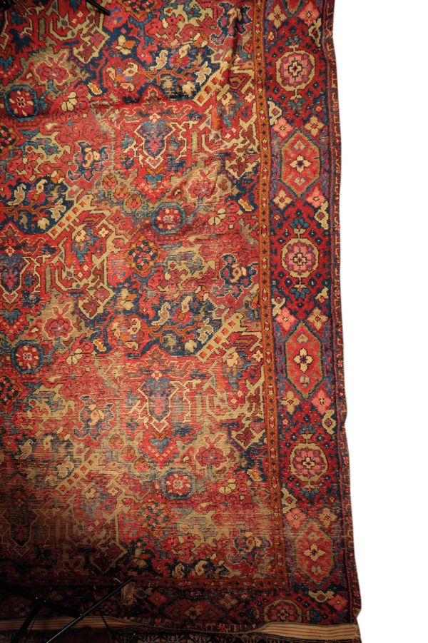 A LARGE TURKISH CARPET FRAGMENT