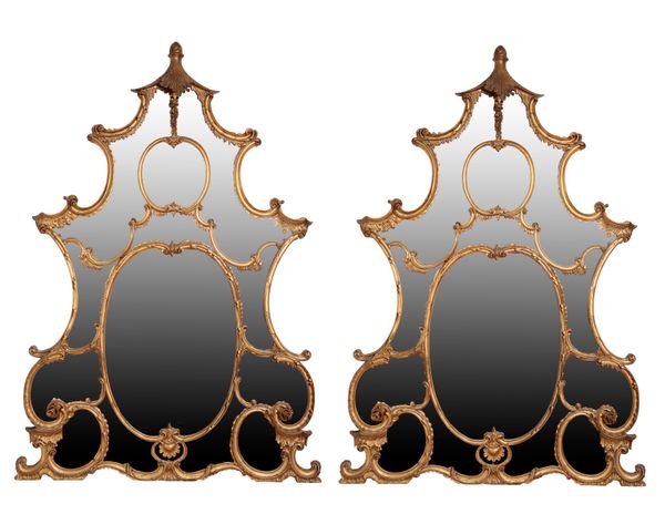 A PAIR OF CARVED GILTWOOD AND COMPOSITION OVERMANTEL MIRRORS,