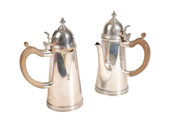 A PAIR OF MATCHED 20TH CENTURY SILVER COFFEE/CHOCOLATE POT,