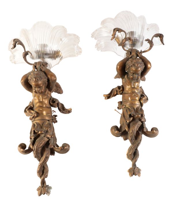 A PAIR OF GILT BRONZE AND GLASS FIGURAL WALL APPLIQUES,