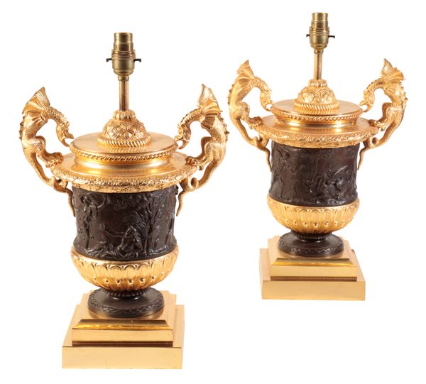 A PAIR OF GILT AND PATINATED BRONZE URN TABLE LAMPS,