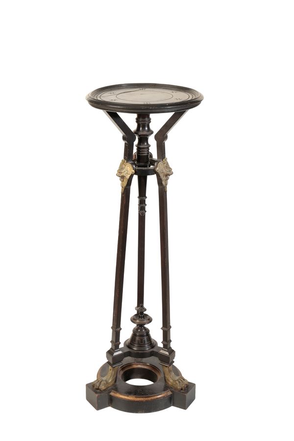 AN AESTHETIC MOVEMENT EBONISED WOOD AND GILT METAL MOUNTED TORCHERE OR VASE STAND,