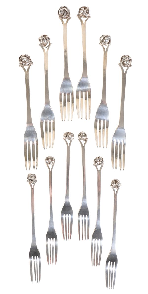 TWO SETS OF SIX SILVER FORKS,