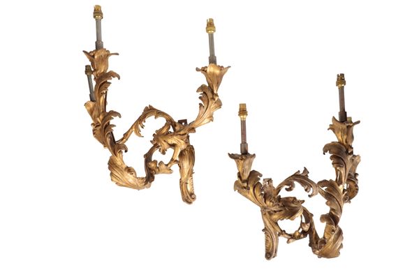 TWO PAIRS OF GILT COMPOSITION THREE LIGHT WALL APPLIQUES, IN LOUIS XV STYLE,