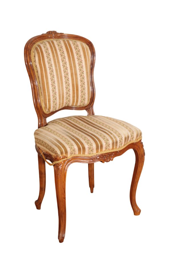 A CARVED BEECH AND UPHOLSTERED SIDE CHAIR, IN LOUIS XV STYLE,