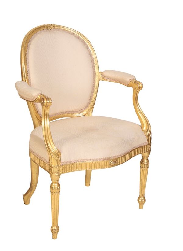 A GILTWOOD AND UPHOLSTERED FAUTEUIL, IN LATE LOUIS XV TASTE,