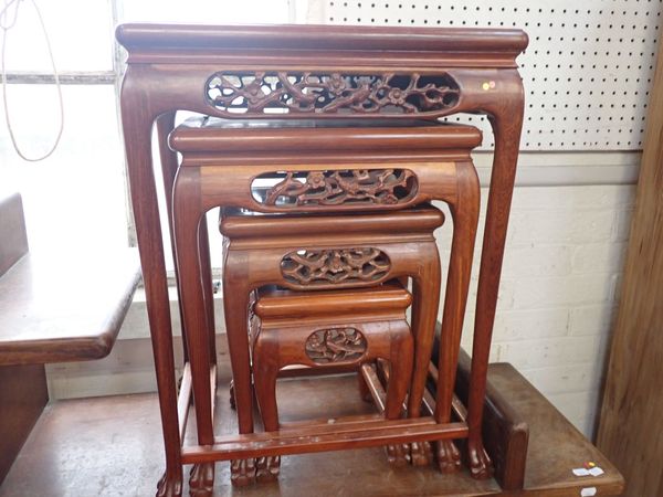 A NEST OF FOUR CHINESE HARDWOOD TABLES