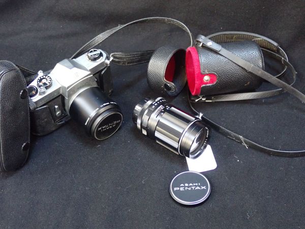 AN ASAHI PENTAX SPOTOMATIC CAMERA