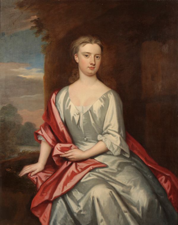SIR GODFREY KNELLER (1646-1723) A portrait of a young girl wearing an ivory silk gown with red shawl