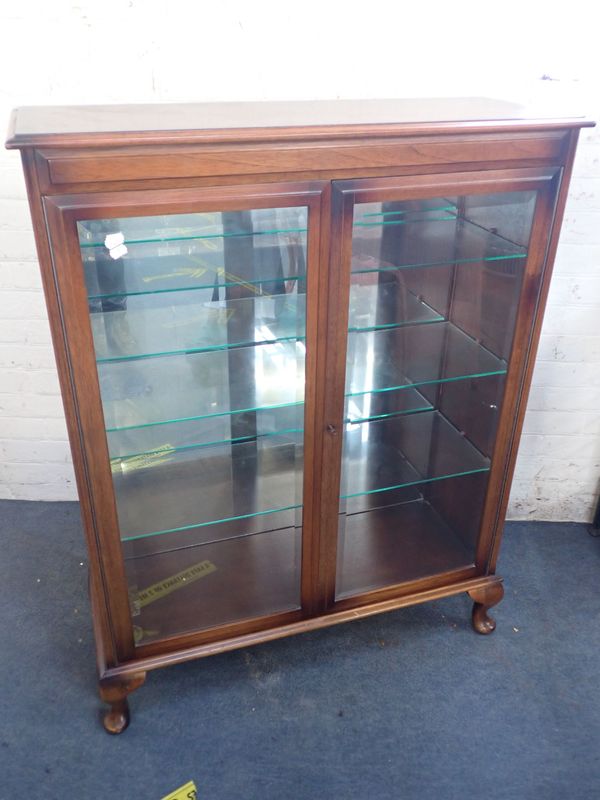 A REPRODUCTION GLAZED DISPLAY CABINET