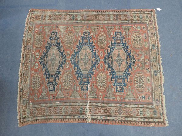 AN OLD CAUCASIAN STYLE RUG, WITH GEOMETRIC DESIGN