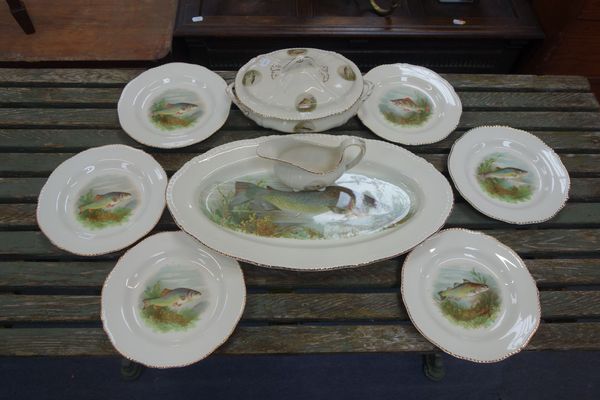 A WOODS 'IVORY WARE' PART DINNER SERVICE DECORATED WITH FISH