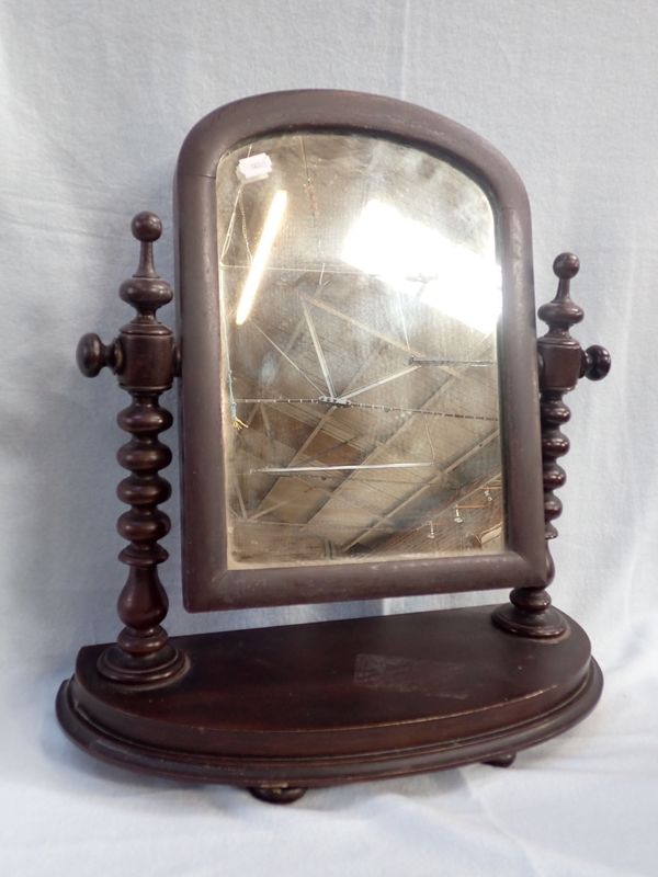 A VICTORIAN DRESSING MIRROR WITH BOBBIN TURNED SUPPORTS