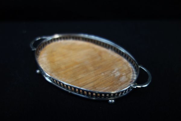 A MINIATURE OVAL TRAY