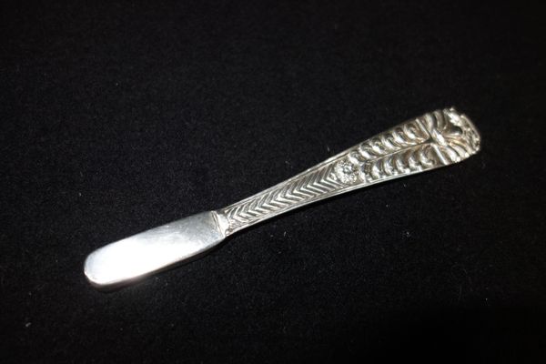 A GEORGE III SILVER TOOTH BRUSH