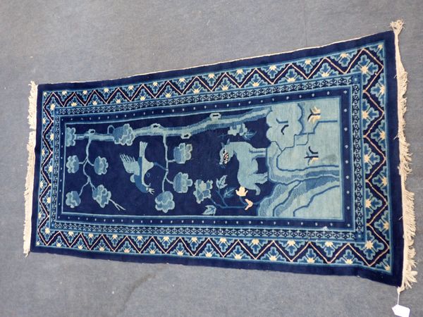 A BLUE GROUND CHINESE RUG