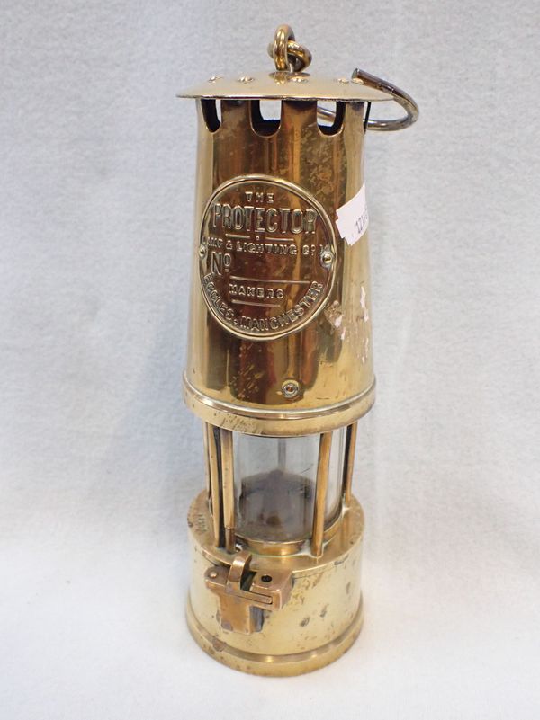 A BRASS MINER'S LAMP