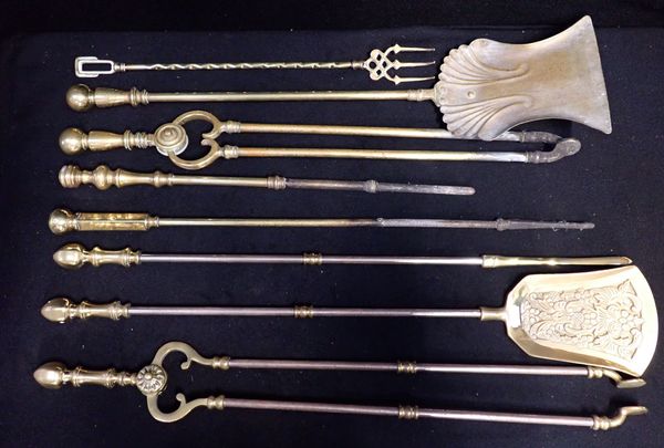 A COLLECTION OF BRASS FIRE TOOLS