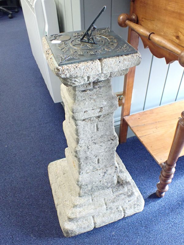 A RE-CONSTITUTED STONE SUNDIAL