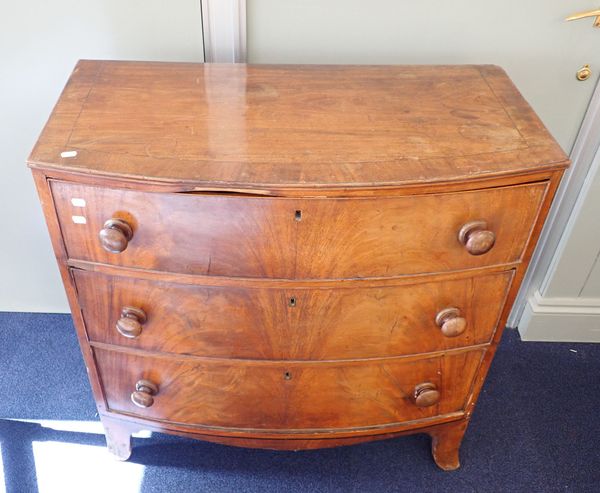 A 19TH CENTURY MAHOGANY BOW FRONTED CHEST OF DRAWERS