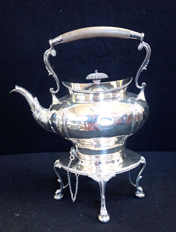 A SILVER TEA KETTLE ON STAND, WITH BURNER