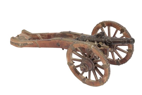 A FINE BRONZE MODEL OF A FIELD CANNON