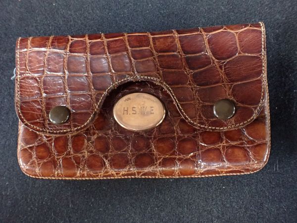 A CROCODILE LEATHER PURSE