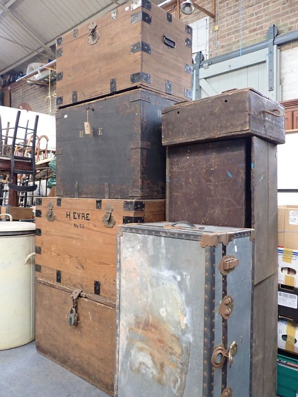 A COLLECTION OF VINTAGE WOODEN TRUNKS