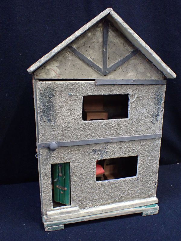 A VINTAGE SMALL DOLL'S HOUSE