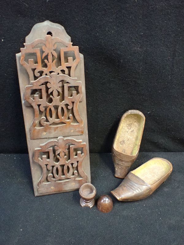A PAIR OF 19TH CENTURY MINIATURE CARVED WOODEN CLOGS