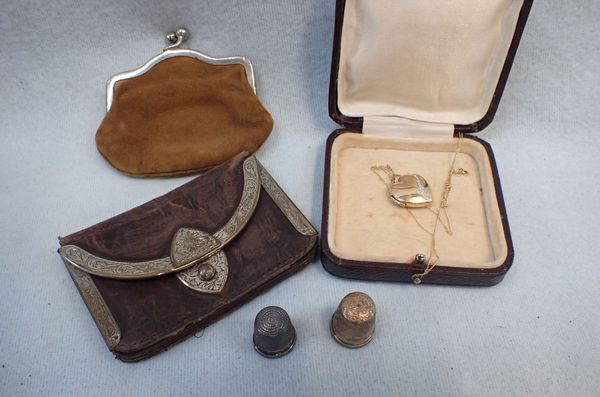 TWO SILVER THIMBLES