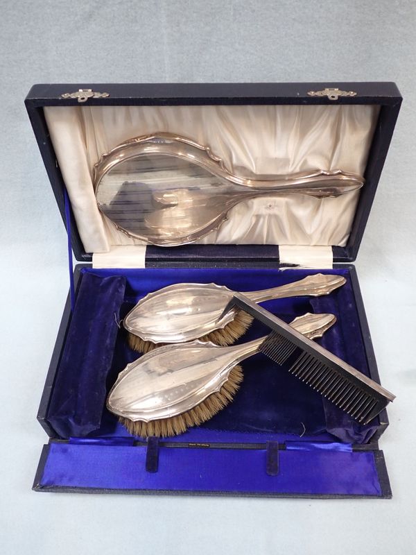 A SILVER BACKED BRUSH SET
