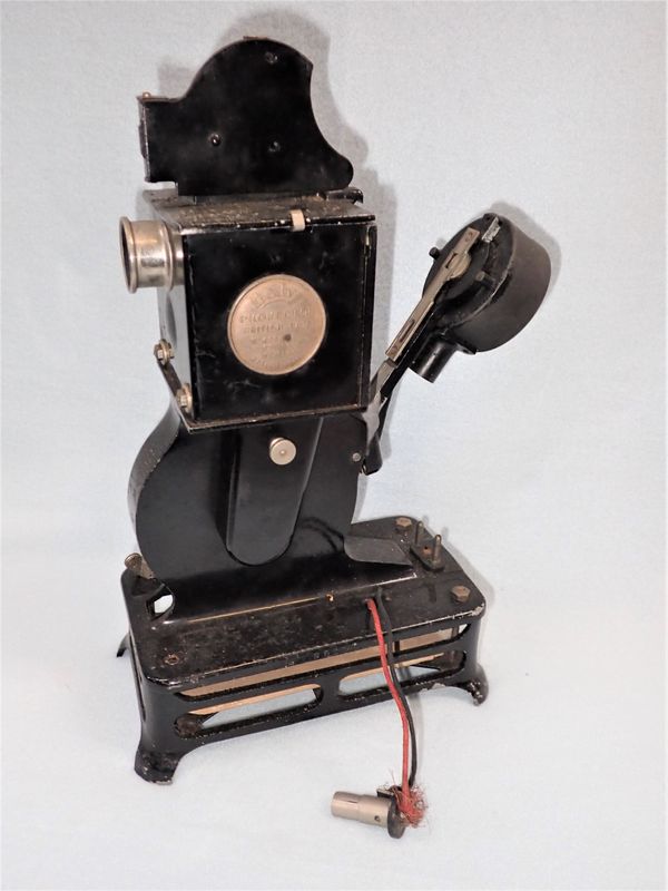 A VINTAGE 'BABY' PROJECTOR