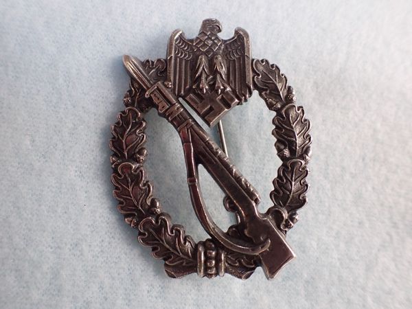 A NAZI STYLE BADGE