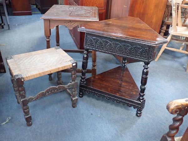 AN EDWARDIAN 'JACOBEAN' STYLE TRIANGULAR OCCASIONAL TABLE