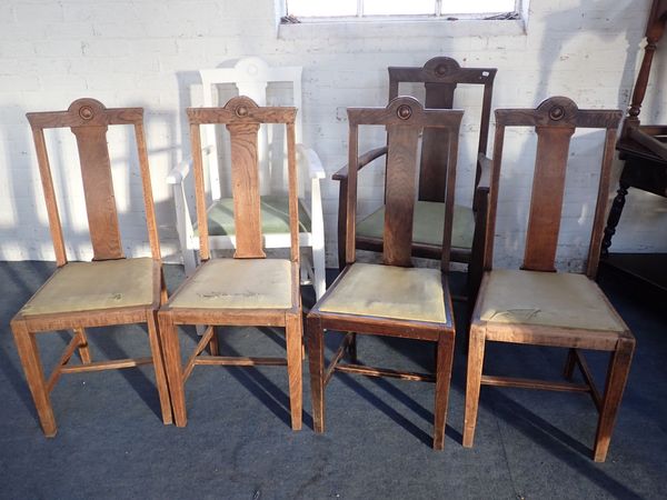 A SET OF SIX ARTS AND CRAFTS STYLE OAK DINING CHAIRS