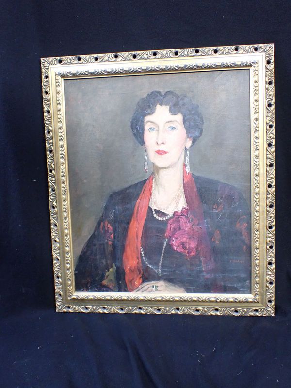 A 20H CENTURY OIL ON CANVAS PORTRAIT OF A LADY