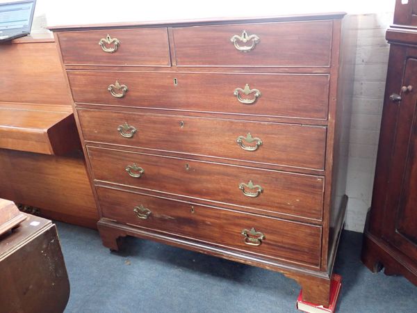 A LARGE MAHOGANY CHEST OF DRAWERS