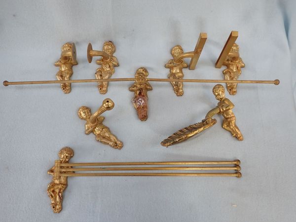 A COLLECTION OF GILT BRASS BATHROOM FITTINGS