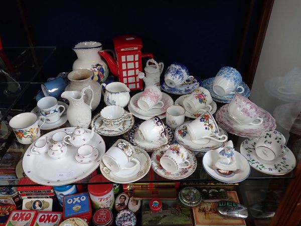 A COLLECTION OF EDWARDIAN CABINET CUPS AND SAUCERS